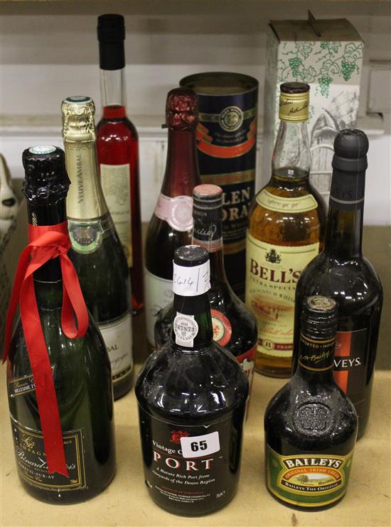 11 assorted bottles, including Champagne, Port and Whiskey